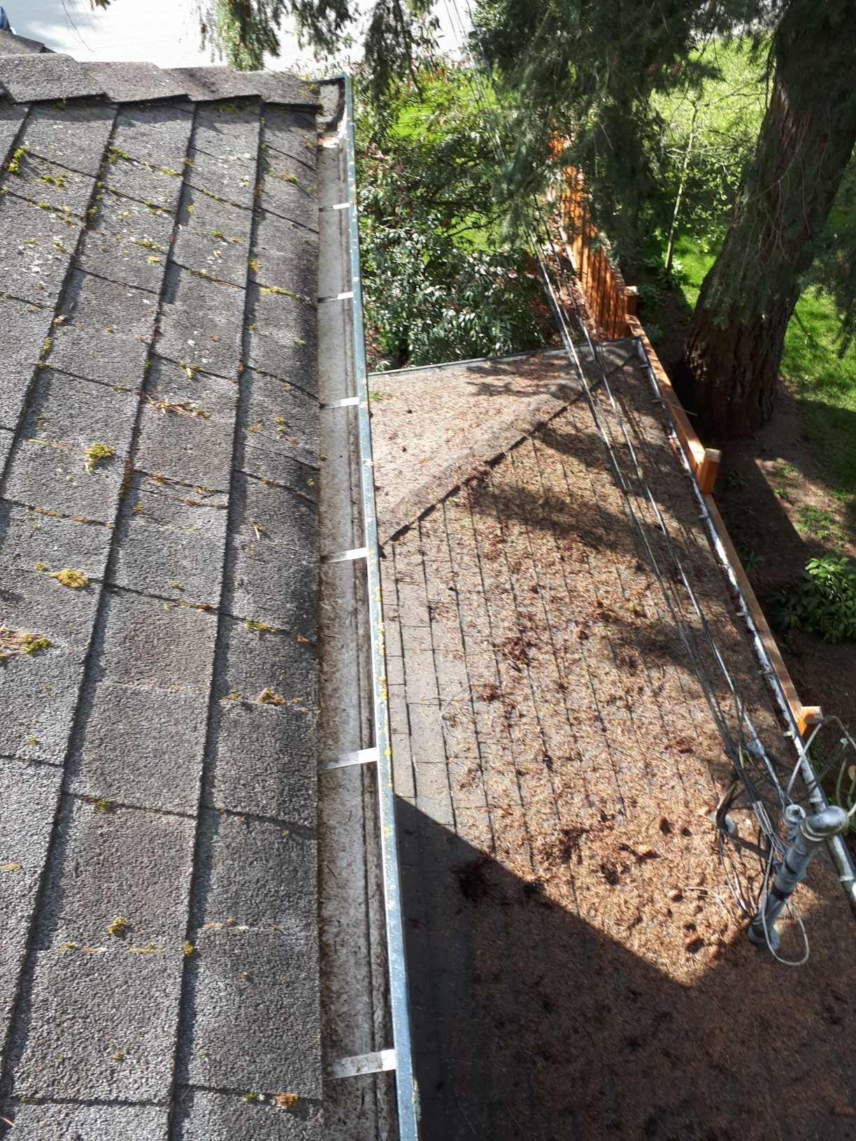 Residential gutter after debris removal