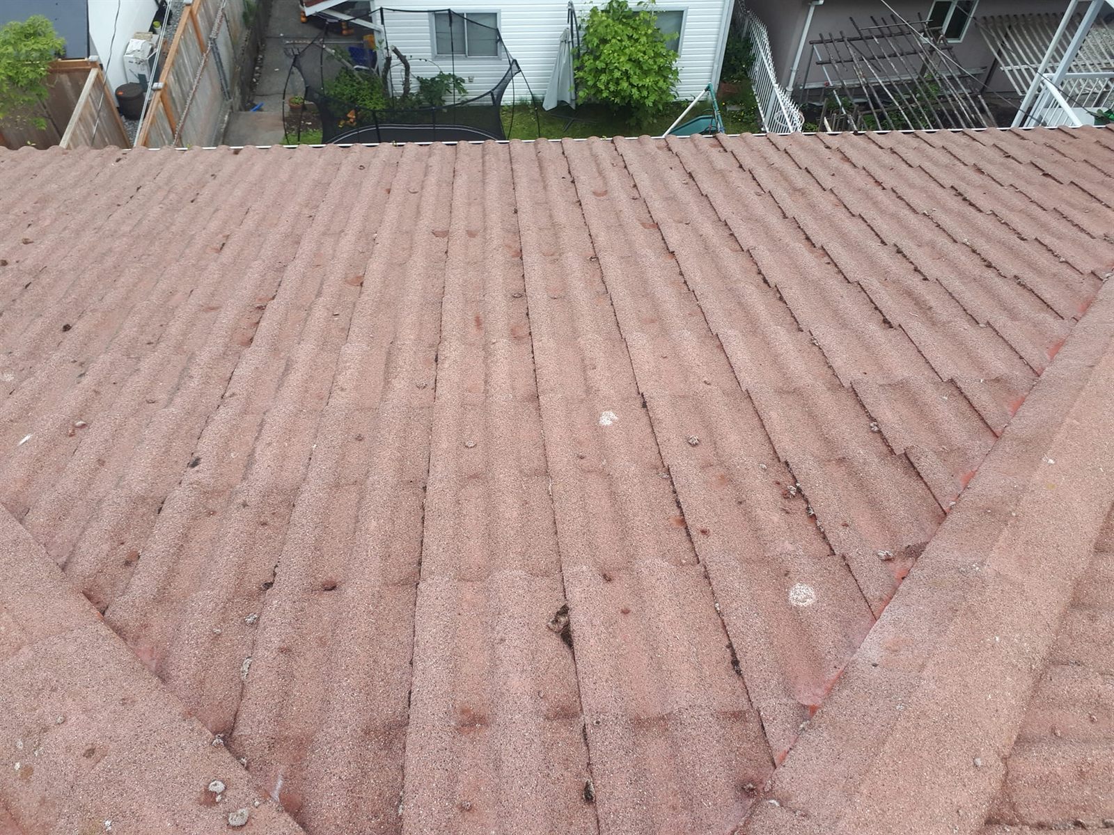 Residential roof after moss removal and roof cleaning